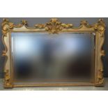 19th Century carved gilt wood rectangular over mantel mirror with foliate C scroll mouldings