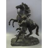 After Coustou, Marley horse group, rearing stallion with handler on naturalistic base, patinated