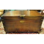 20th Century mahogany campaign style trunk with brass mounts and circular recessed handles and brass