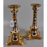 A pair of Royal Crown Derby English bone china Imari candlesticks, 27cm high approx. (2) (B.P. 21% +