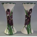 Pair of Llanelly pottery waisted cylinder vases hand painted with irises on a cream ground,