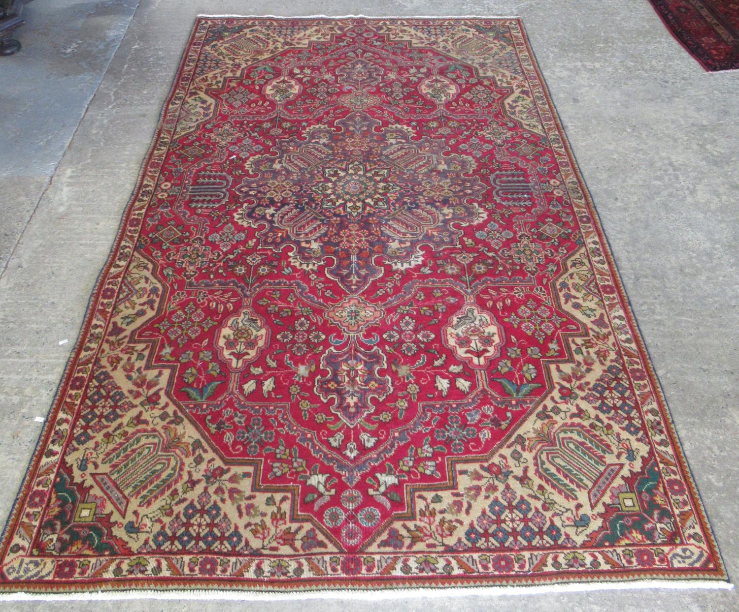 Vintage style Morty multi-coloured ground Persian Tabrez carpet with central medallions of flowers