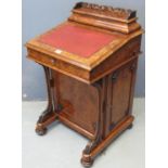 Victorian burr walnut Davenport desk, the fret cut top revealing hinged lid with various