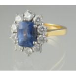 18ct gold sapphire and diamond cluster ring. Ring size M&1/2. Approx weight 6.6 grams. (B.P. 21% +