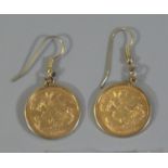 Pair of Edward VII gold half sovereigns, 1902 & 1903, set within earring mounts. Total weight 10g