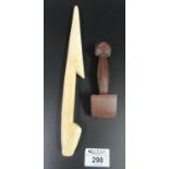 Probably 19th Century whale bone carved sailors needle, together with a moulded wooden caulker or '