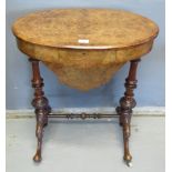 Victorian inlaid burr walnut ladies work box/sewing table of oval form, standing on turned