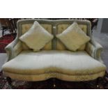 Late Victorian green foliate upholstered button back two seater parlour sofa of low proportions, the
