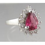 9ct white gold pink tourmaline and diamond ring. The pear shaped pink tourmaline surrounded by