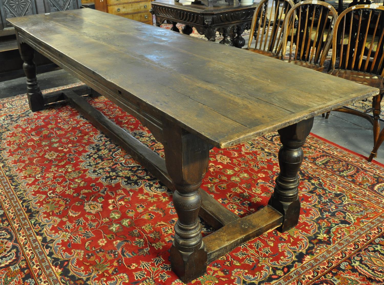 17th Century style oak cleated three plank top refectory table of narrow proportions standing on