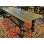 17th Century style oak cleated three plank top refectory table of narrow proportions standing on