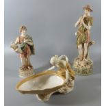 Royal Dux Art Nouveau table centrepiece, modelled as a maiden clasping a mollusc shell on moulded