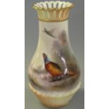 Royal Worcester porcelain vase of baluster form, the filigree top above hand painted decoration of