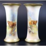 Pair of early 20th Century Royal Worcester porcelain vases of waisted form, hand painted with