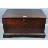 18th Century style Welsh oak coffwr bach of plain rectangular form, on a projecting base with