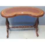 Victorian burr walnut kidney shaped writing table, the leather inset and carved top above turned and