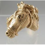 9ct gold ring modelled as a horse's head. Ring size U. Approx weight 21.2 grams. (B.P. 21% + VAT)