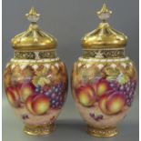 Pair of Royal Worcester 1970's porcelain crown top pot-pourri jars and reticulated covers with inner