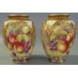 Pair of 1970's Royal Worcester hand painted vases of baluster from decorated with fruits, foliage