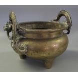 Chinese bronze baluster shaped censer with Chilong dragon mounts on three feet. Circular cast seal