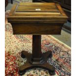 19th Century rosewood teapoy, the moulded rectangular top with hinged lid revealing four lidded