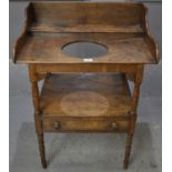 Early 19th Century oak washstand having carved fan decoration with under tier and single drawer with