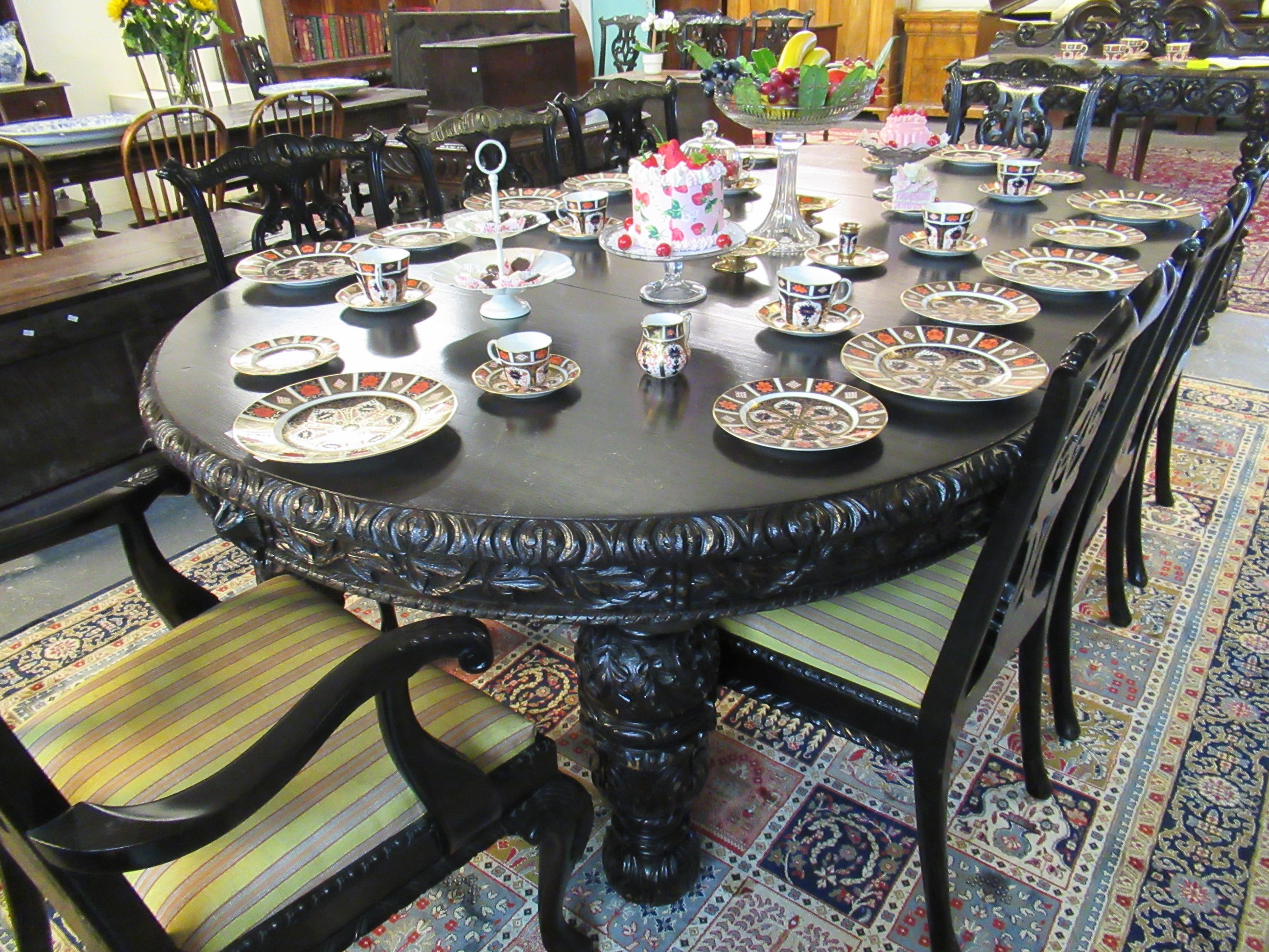 Late Victorian stained oak extending dining table with three additional leaves and winder. The - Image 9 of 11