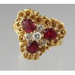 18ct gold ruby and diamond cluster ring. Ring size M. Approx weight 6.4 grams. (B.P. 21% + VAT)