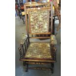 Early 20th Century stained American style spring rocking upholstered armchair. (B.P. 21% + VAT)