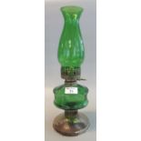 Early 20th Century single oil burner having green glass chimney and reservoir on a plated base. (B.