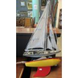 Vintage wooden model of a child's pond yacht marked 'Star Yacht', together with modern model of a