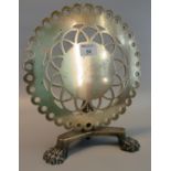 19th Century brass trivet in the form of a pierced circular snap top pedestal table on triform