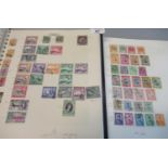 All world collection of stamps in two albums. 100's of stamps mostly used. (B.P.21% + VAT)