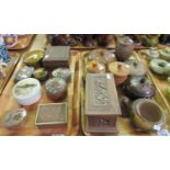 Two trays of treen boxes and other items, some carved with floral and other designs, reproduction '