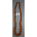String of amber and resin mix beads. (B.P. 21% + VAT)