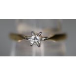 9ct gold diamond solitaire ring. Ring size L. Approx weight 2.6 grams. (B.P. 21% + VAT)