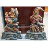 Pair of cast metal doorstops in the form of Punch and Judy. (B.P. 21% + VAT)