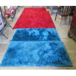 Pair of Lagoon Indulgent blue ground shag pile rugs. 80 x 150cm approx. Together with two similar