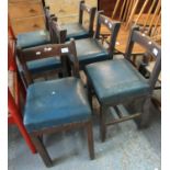 A set of six oak bar back child's chairs with leather finish seats on square supports and
