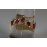 14ct gold ruby and diamond wishbone ring. Ring size M. Approx weight 2.3 grams. (B.P. 21% + VAT)