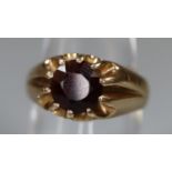 9ct gold and garnet ring. Ring size N &1/2. Approx weight 6.2 grams. (B.P. 21% + VAT)