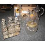 Box containing two cut glass decanters and a beautifully etched glass and white metal carafe, two