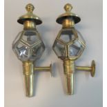 Pair of brass bulkhead or miniature carriage lamps with hexagonal glazing panels and fixing bracket.
