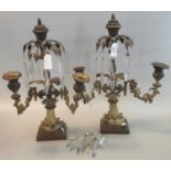 Pair of early 19th Century Empire design two branch gilt metal table candelabra with glass
