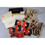 Box of lapels and ribbon bars, some with military studs etc, together with an OBE box (no contents).