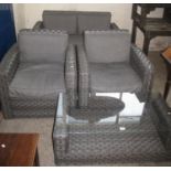 Modern wicker finish conservatory suite comprising; two seater sofa, pair of armchairs and a glass