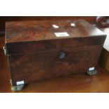 Regency mahogany tea caddy of rectangular form standing on metal feet. (B.P. 21% + VAT)