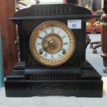 Late 19th/early 20th Century black slate architectural mantel clock with lion mask mounts and