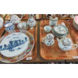 Two trays of oriental porcelain and pottery items to include; a Japanese part teaset including tea