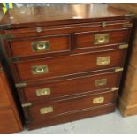 Reproduction mahogany campaign style chest of drawers with pull out leather writing slope and